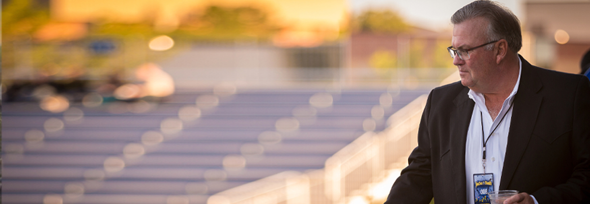 Dana Dykhouse looking over stadium