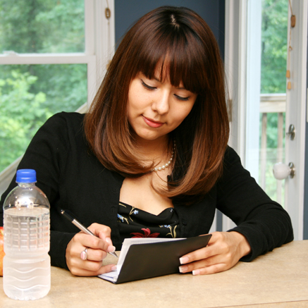 woman writing check
