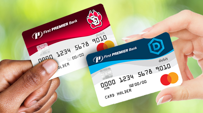 woman looking at credit card