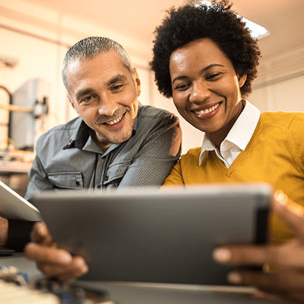 FREE Online & Mobile Banking Male and Female looking at tablet