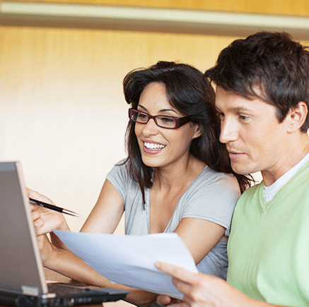 couple looking at laptop