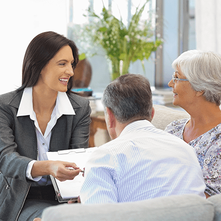 First PREMIER Bank: A Leader in Trust Services woman talking to couple