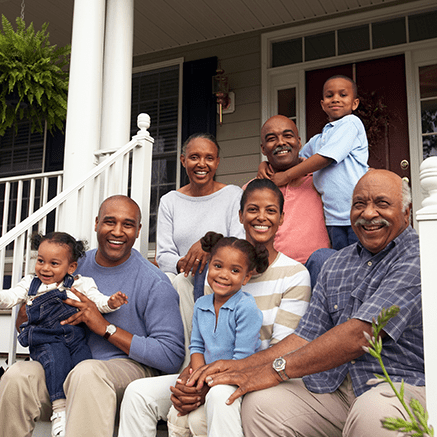 Dynasty Trusts family sitting on porch step