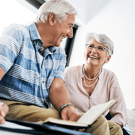 couple looking at book