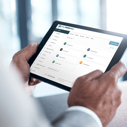 man looking at tablet