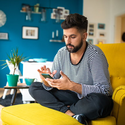 A Bounty of Benefits man looking at tablet